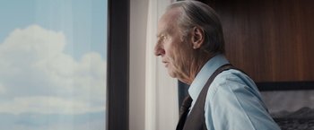 Movie still from “Gold” (2016), directed by Stephen Gaghan – An older man looking out of a window; Close Up shot, Low angle