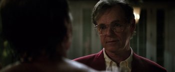 Movie still from “Gold” (2016), directed by Stephen Gaghan – An older man wearing glasses talking to a younger man; Close Up shot, Over the shoulder angle