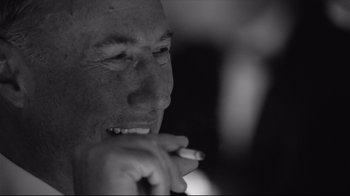 Movie still from “Good Night, and Good Luck.” (2005), directed by George Clooney – A person smoking a cigarette; Close Up shot, Low angle