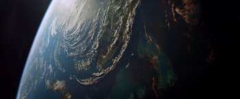 Movie still from “Gravity” (2013), directed by Alfonso Cuarón – A satellite image of the earth taken from space; Extreme Wide shot, Overhead angle