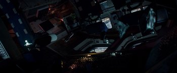 Movie still from “Gravity” (2013), directed by Alfonso Cuarón – An overhead view of a room with a computer and other electronics; Wide shot, Overhead angle