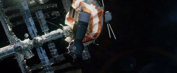Movie still from “Gravity” (2013), directed by Alfonso Cuarón – An image of a space station in the space; Extreme Wide shot, Overhead angle