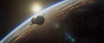 Movie still from “Gravity” (2013), directed by Alfonso Cuarón – A view of the earth taken from a space station; Extreme Wide shot, Low angle