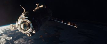 Movie still from “Gravity” (2013), directed by Alfonso Cuarón – A view of the earth at night from a space station; Extreme Wide shot, Low angle