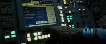 Movie still from “Gravity” (2013), directed by Alfonso Cuarón – A control panel with a glove on top of it; Extreme Close Up shot, High angle