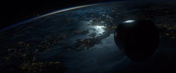 Movie still from “Gravity” (2013), directed by Alfonso Cuarón – A view of the earth at night taken from a plane; Extreme Wide shot, Overhead angle