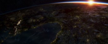 Movie still from “Gravity” (2013), directed by Alfonso Cuarón – An aerial view of the earth at night with lights; Extreme Wide shot, High angle