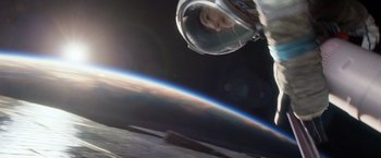 Movie still from “Gravity” (2013), directed by Alfonso Cuarón – A view of the earth taken from a space station; Wide shot, Overhead angle