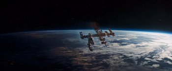 Movie still from “Gravity” (2013), directed by Alfonso Cuarón – A view of the earth from the space station; Extreme Wide shot, Overhead angle