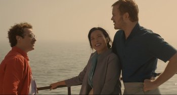 Movie still from “Her” (2013), directed by Spike Jonze – A man and a woman standing next to each other on a boat; Medium shot, High angle