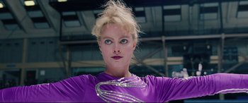 Movie still from “I, Tonya” (2017), directed by Craig Gillespie – A woman in a purple shirt is looking at the camera; Close Up shot, Low angle