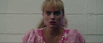 Movie still from “I, Tonya” (2017), directed by Craig Gillespie – A person wearing a pink dress; Close Up shot, Low angle