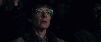 Movie still from “I, Tonya” (2017), directed by Craig Gillespie – An older woman wearing glasses and a fur coat; Close Up shot, Low angle