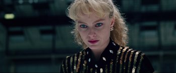 Movie still from “I, Tonya” (2017), directed by Craig Gillespie – A person with blonde hair and blue eyes; Close Up shot, Low angle