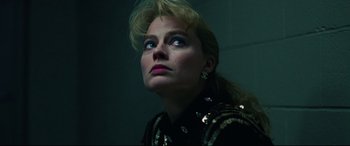 Movie still from “I, Tonya” (2017), directed by Craig Gillespie – A person wearing a black jacket; Close Up shot, Low angle