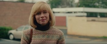 Movie still from “I, Tonya” (2017), directed by Craig Gillespie – A woman with blonde hair wearing a sweater; Close Up shot, Over the shoulder angle