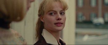 Movie still from “I, Tonya” (2017), directed by Craig Gillespie – A person wearing a jacket; Close Up shot, Over the shoulder angle