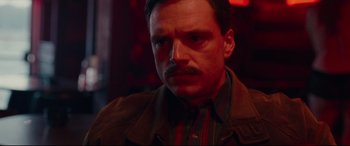 Movie still from “I, Tonya” (2017), directed by Craig Gillespie – A person wearing a jacket; Close Up shot, Over the shoulder angle