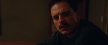 Movie still from “I, Tonya” (2017), directed by Craig Gillespie – A person with a mustache; Close Up shot, Over the shoulder angle