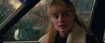 Movie still from “I, Tonya” (2017), directed by Craig Gillespie – A person sitting in a car; Close Up shot, Over the shoulder angle