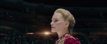 Movie still from “I, Tonya” (2017), directed by Craig Gillespie – A person wearing a red shirt; Close Up shot, Low angle