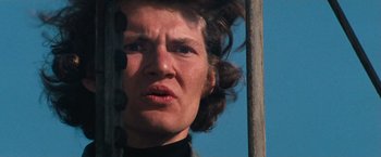 Movie still from “Dirty Harry” (1971), directed by Don Siegel – A person looking at the camera; Close Up shot, Low angle