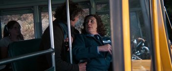 Movie still from “Dirty Harry” (1971), directed by Don Siegel – Two people on a public transit bus; Medium shot, Over the shoulder angle