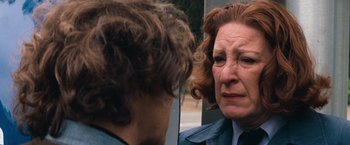 Movie still from “Dirty Harry” (1971), directed by Don Siegel – An older woman looking at herself in the mirror; Close Up shot, Over the shoulder angle