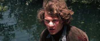Movie still from “Dirty Harry” (1971), directed by Don Siegel – A young man with a nose ring on his face; Close Up shot, Low angle
