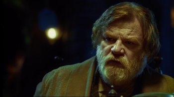 Movie still from “In the Heart of the Sea” (2015), directed by Ron Howard – An older man with a beard and a mustache; Close Up shot, Low angle