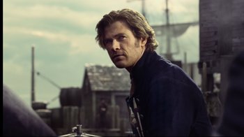 Movie still from “In the Heart of the Sea” (2015), directed by Ron Howard – A person wearing a shirt; Close Up shot, Over the shoulder angle