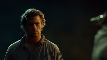 Movie still from “In the Heart of the Sea” (2015), directed by Ron Howard – A person wearing a shirt; Close Up shot, Over the shoulder angle