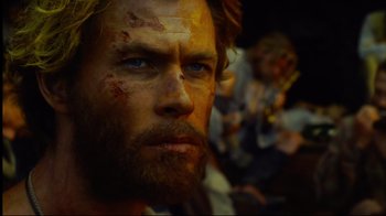Movie still from “In the Heart of the Sea” (2015), directed by Ron Howard – A person with a beard and face paint; Close Up shot, Low angle
