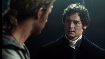 Movie still from “In the Heart of the Sea” (2015), directed by Ron Howard – A man looking at himself in the mirror; Close Up shot, Over the shoulder angle