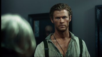 Movie still from “In the Heart of the Sea” (2015), directed by Ron Howard – A person wearing a shirt; Close Up shot, Over the shoulder angle