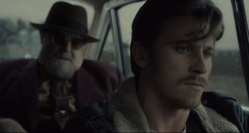 Movie still from “Inside Llewyn Davis” (2013), directed by Ethan Coen – A man and a woman in a car looking out the window; Close Up shot, Over the shoulder angle