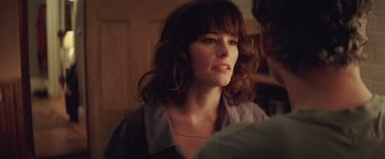 Movie still from “Irrational Man” (2015), directed by Woody Allen – A person wearing a shirt; Close Up shot, Over the shoulder angle