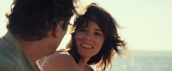 Movie still from “Irrational Man” (2015), directed by Woody Allen – A person with her mouth open; Close Up shot, Over the shoulder angle
