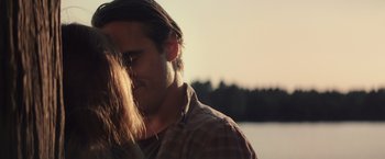 Movie still from “Irrational Man” (2015), directed by Woody Allen – A man and a woman kissing; Close Up shot, Over the shoulder angle