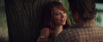 Movie still from “Irrational Man” (2015), directed by Woody Allen – A man and a woman standing next to a tree; Close Up shot, Over the shoulder angle