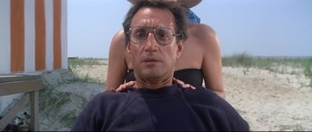 Movie still from “Jaws” (1975), directed by Steven Spielberg – A man and a woman on the beach; Close Up shot, Low angle