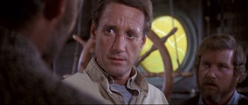 Movie still from “Jaws” (1975), directed by Steven Spielberg – A person wearing a shirt; Close Up shot, Low angle
