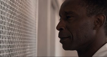 Movie still from “Just Mercy” (2019), directed by Destin Daniel Cretton – A person looking out of a window; Extreme Close Up shot, Low angle