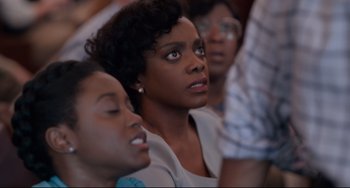 Movie still from “Just Mercy” (2019), directed by Destin Daniel Cretton – A group of women sitting next to each other in a room; Close Up shot, Over the shoulder angle