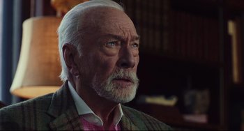 Movie still from “Knives Out” (2019), directed by Rian Johnson – An older man with a beard and a mustache; Close Up shot, Low angle