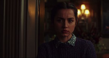 Movie still from “Knives Out” (2019), directed by Rian Johnson – A woman standing in front of a door looking at the camera; Close Up shot, Over the shoulder angle