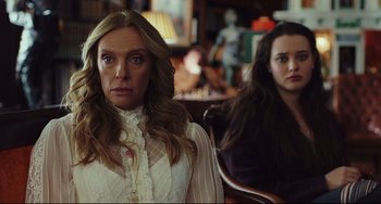 Movie still from “Knives Out” (2019), directed by Rian Johnson – Two women sitting in front of each other in a room; Medium shot, Over the shoulder angle