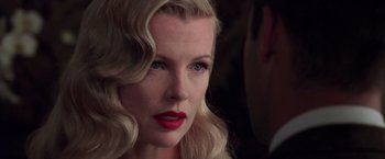 A person wearing a red lipstick