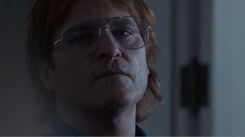 Movie still from “Don't Worry, He Won't Get Far on Foot” (2018), directed by Gus Van Sant – A person wearing glasses; Close Up shot, Low angle
