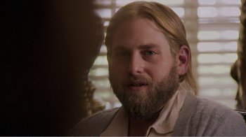 Movie still from “Don't Worry, He Won't Get Far on Foot” (2018), directed by Gus Van Sant – A person with long hair and a beard; Close Up shot, Over the shoulder angle